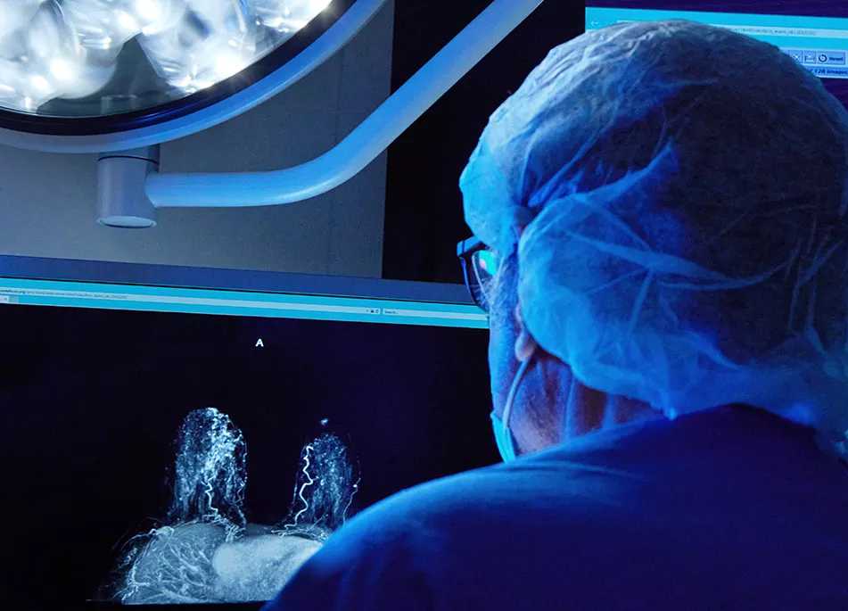 Technician looking at images 