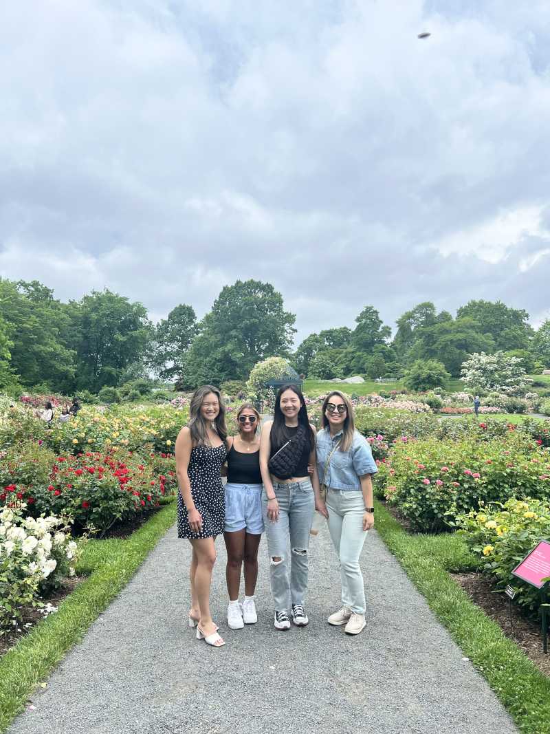 group of four outside in park