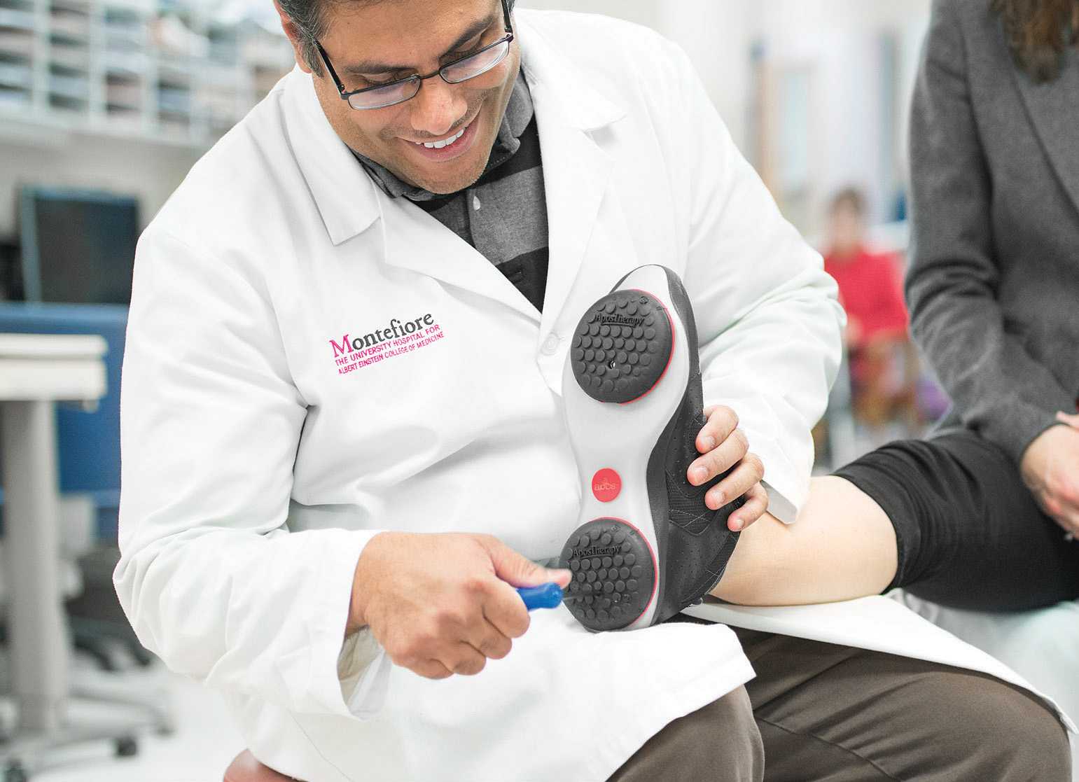 Clinical Outcomes of a New Foot-Worn Non-Invasive Biomechanical Intervention Compared to Traditional Physical Therapy in Patients With Chronic Low Back Pain. A Randomized Clinical Trial