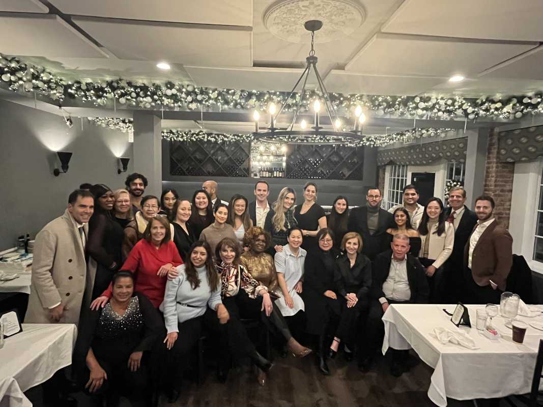 Large group photo at a dinner